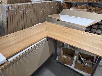 L-shaped oak tabletop with cable management unit